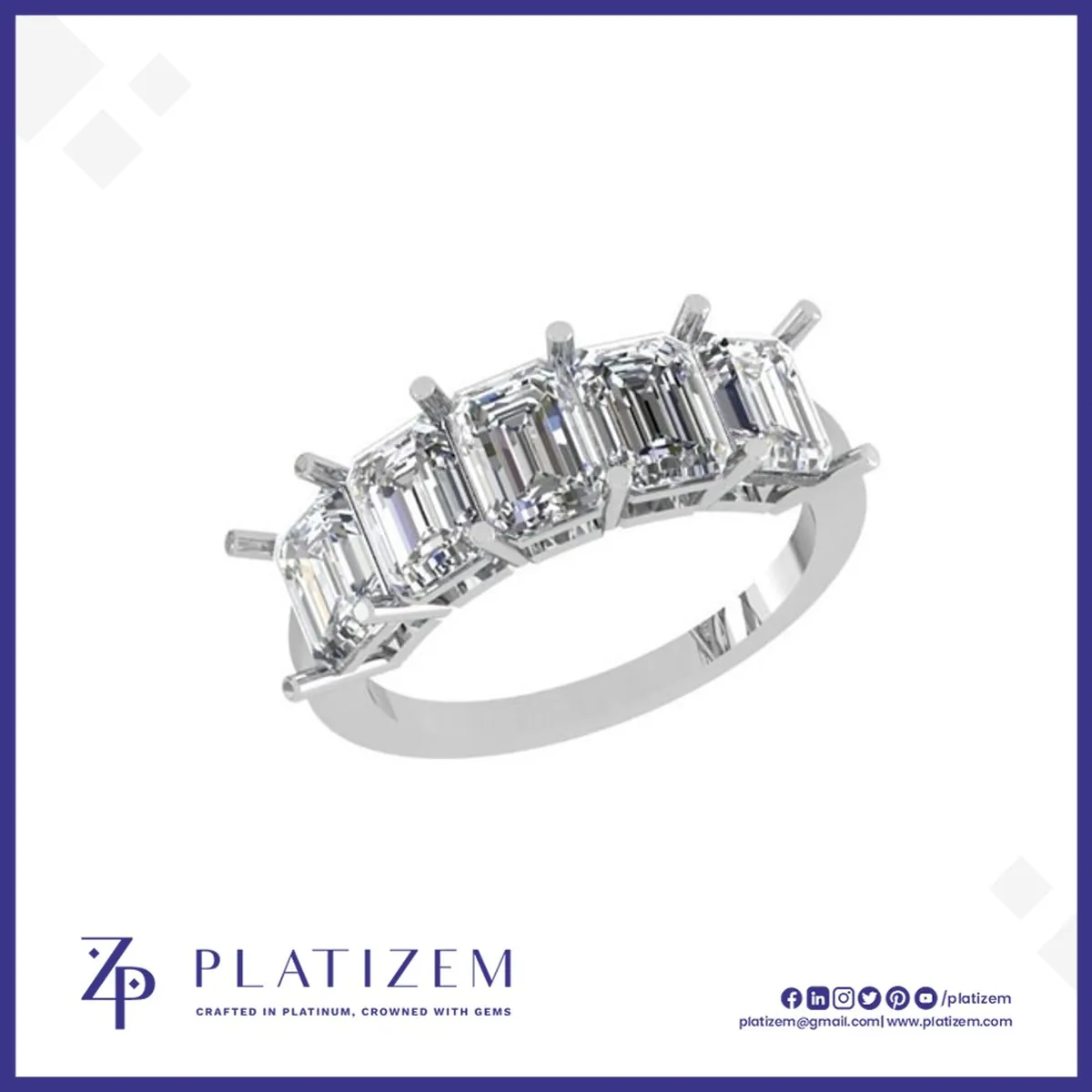 Five Emerald Cut Diamonds Set in a Row Across a Classic Prong Band