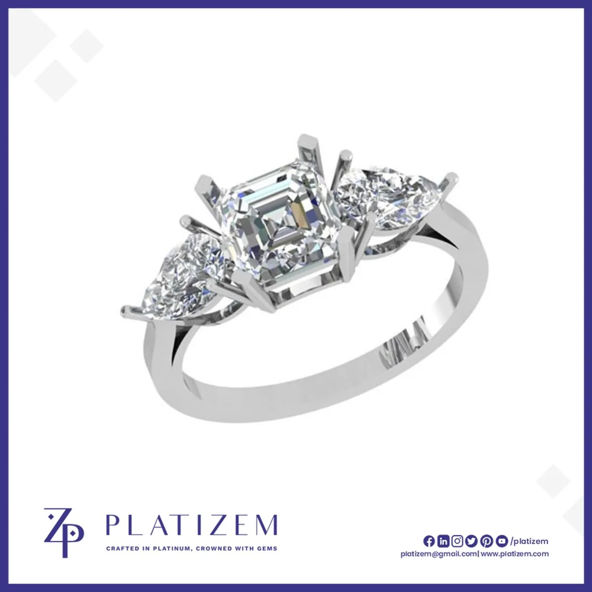 Emerald and Pear Three Stone Diamond Ring